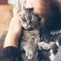 5.-Man-cuddling-pet-cat-200x200